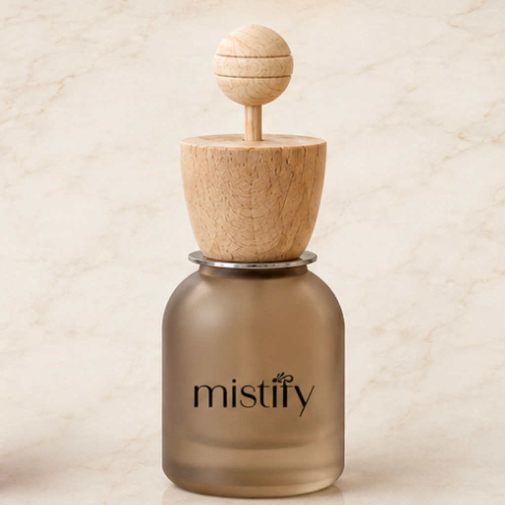 Mistify Parfums car diffuser in brown with a sleek design, used to distribute your preferred scent inside a vehicle.
